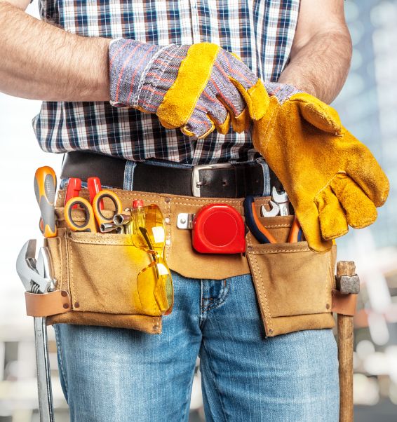 handyman wearing protection gloves and tool belt indian river mi